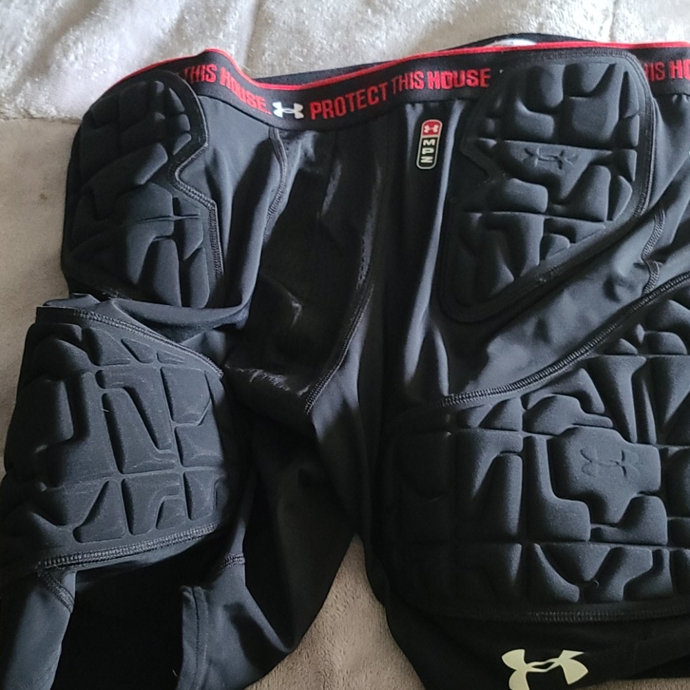 Under Armour padded football shorts